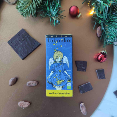 coffret chocolat de Noël, chocolats festifs, sélection gourmande de Noël, Cadeau chocolat de fin d'année, édition limitée chocolat Noël, chocolats artisanaux pour les fêtes, saveurs de Noël en chocolat, coffret exclusif de chocolats festifs, dégustation de chocolat de Noël, chocolats bean-to-bar pour les fêtes