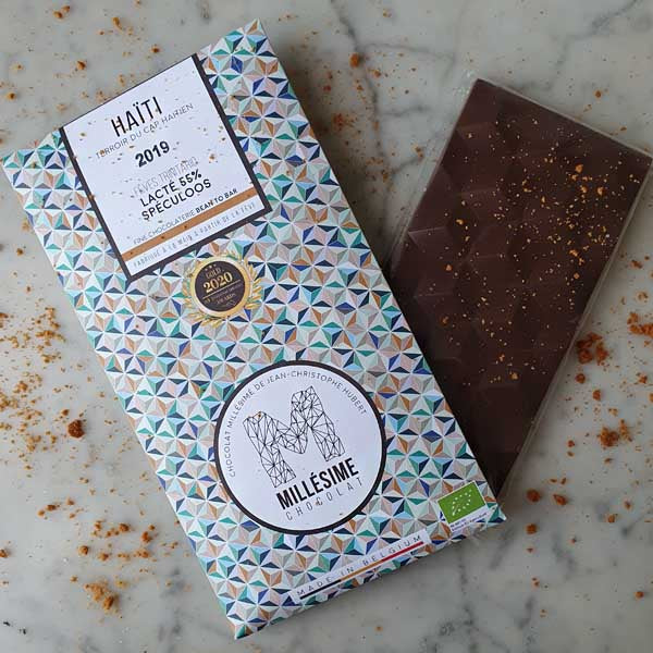 Millésime 55% au spéculoos d’Haïti Tablette chocolat  plaquette de chocolat  Millésimé  fête des pères  Fête des grands-mères  Chocolats originaux  chocolatier  Chocolat spéculoos  CHOCOLAT MILLESIME  Chocolat d'origine Haïti  chocolat d'origine  chocolat d'exception  Chocolat bio  chocolat belge  chocolat au lait  chocolat artisanal  chocolat  black friday  Bean-to-Bar  artisan chocolatier
